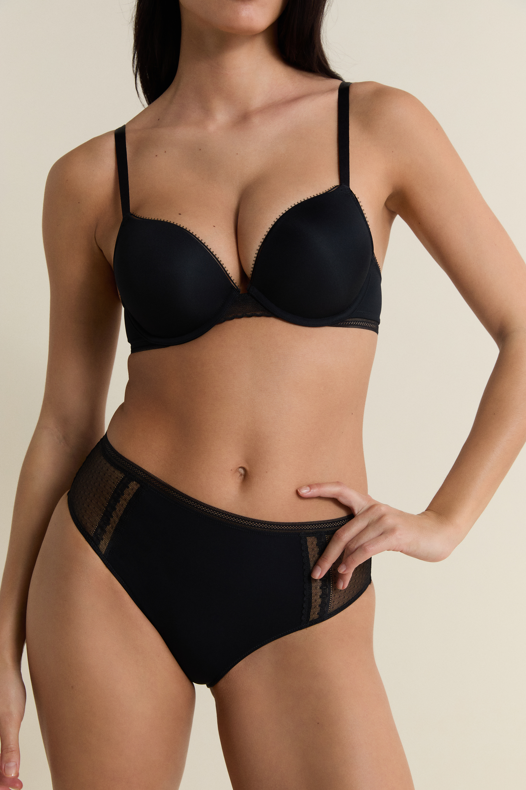 Spodnie midi z koronkowymi detalami